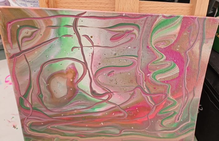 Alexreart1 Abstract artwork with swirls of pink, green, and gold on a textured surface.