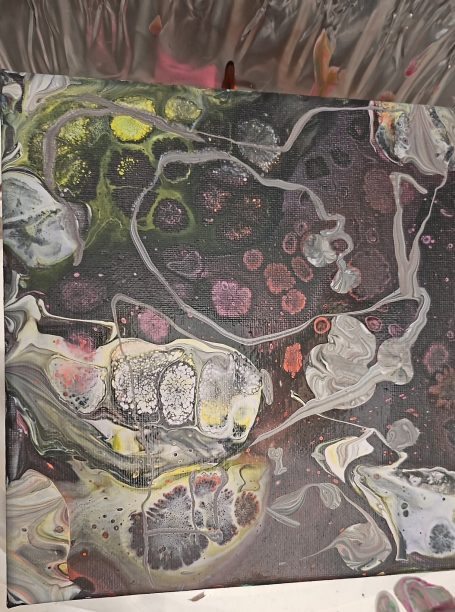 Alexreart2 Abstract design with swirling patterns in dark hues, featuring vibrant splashes of colour.